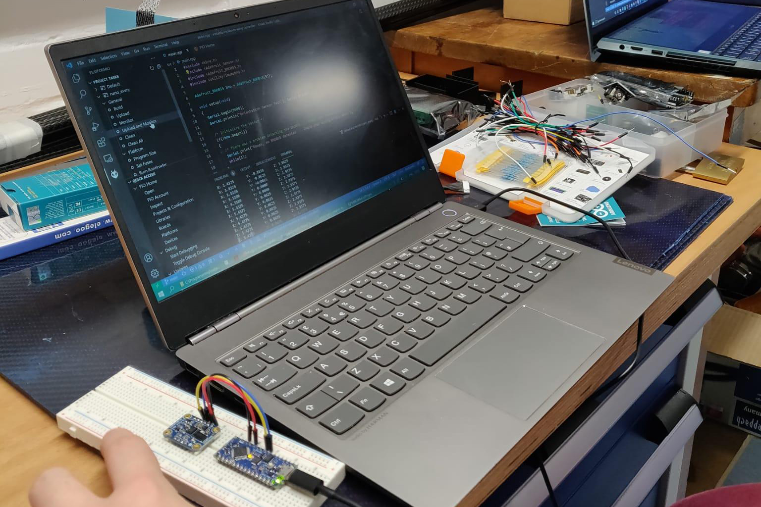 The Avionics team programming an Arduino