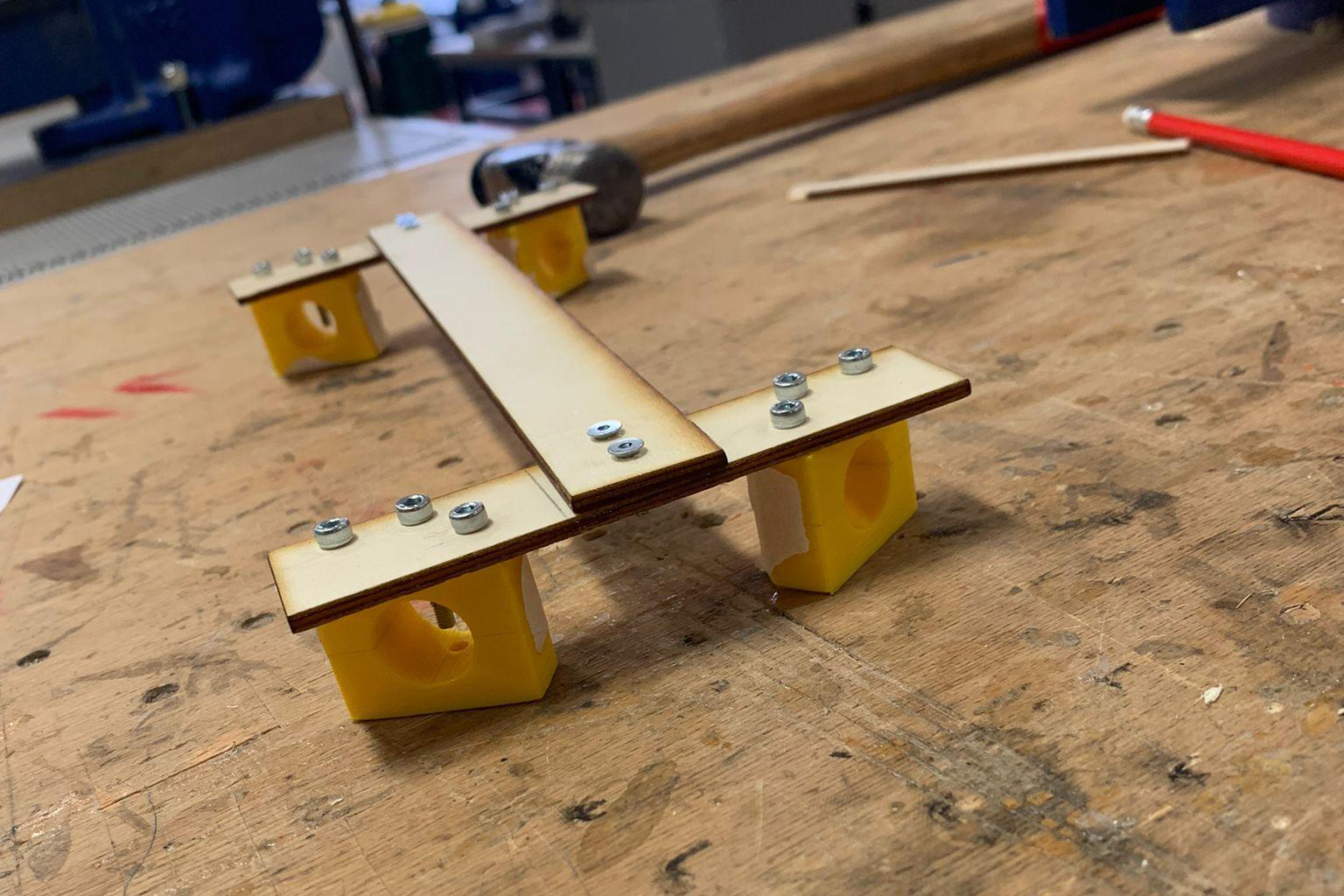 A plywood I-Beam with the 3D printed motor clips